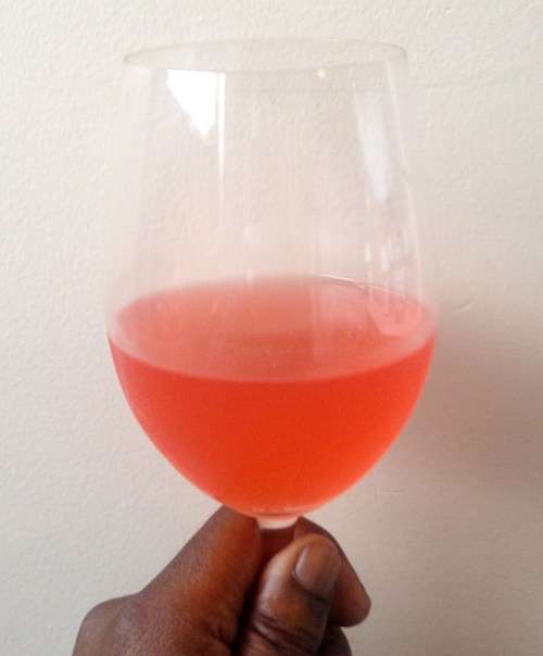 blood orange melomel in a wine glass