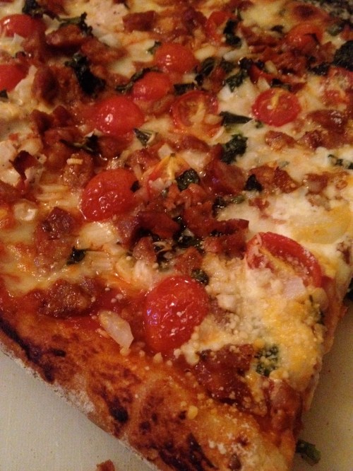 Sausage, anchovy, onion, grape tomatoes, basil.